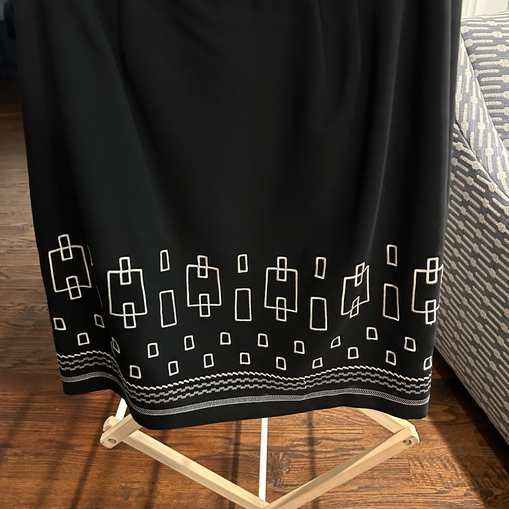 Knee length black pencil skirt
